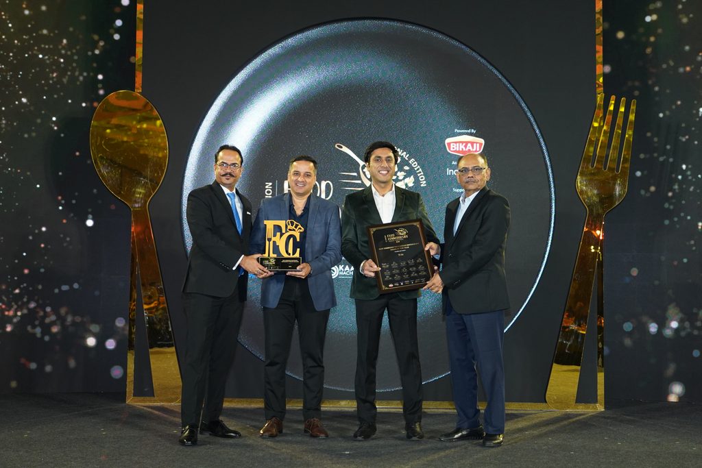 Tulsi receiving the Best Emerging Vegetarian Restaurant Chain of the Year award at Food Connoisseurs India Awards 2026